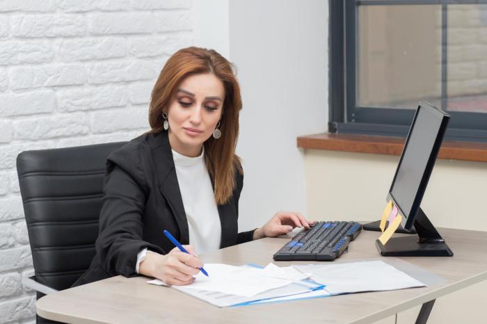 female financial advisor working in office financial advisor transitions 