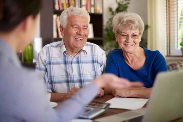 elderly clients meeting with financial advisor financial advisor transitions