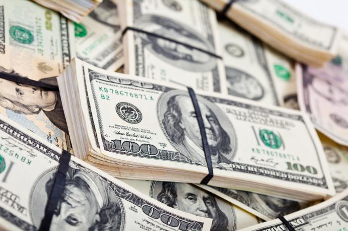 stacks of dollar bills financial advisor transitions 